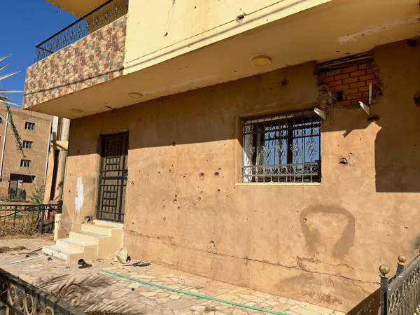 Entrance With Bullet Holes